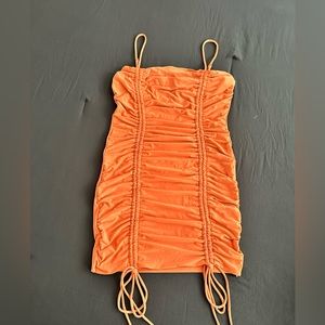 Pink ruched mini dress